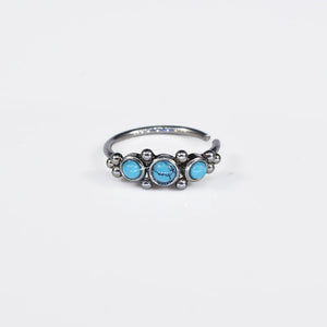 tribal style nose ring with blue turquoise stones and dots