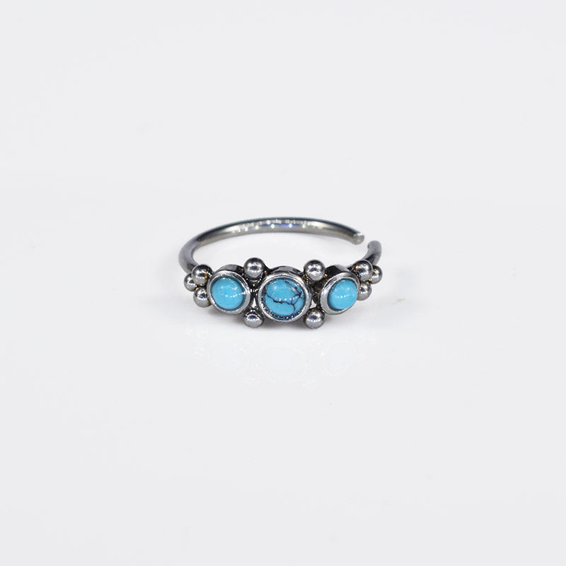 tribal style nose ring with blue turquoise stones and dots