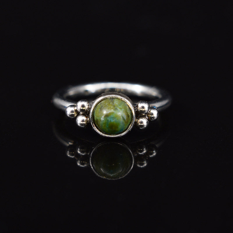 hinged segment ring with african jade stone and tribal dots