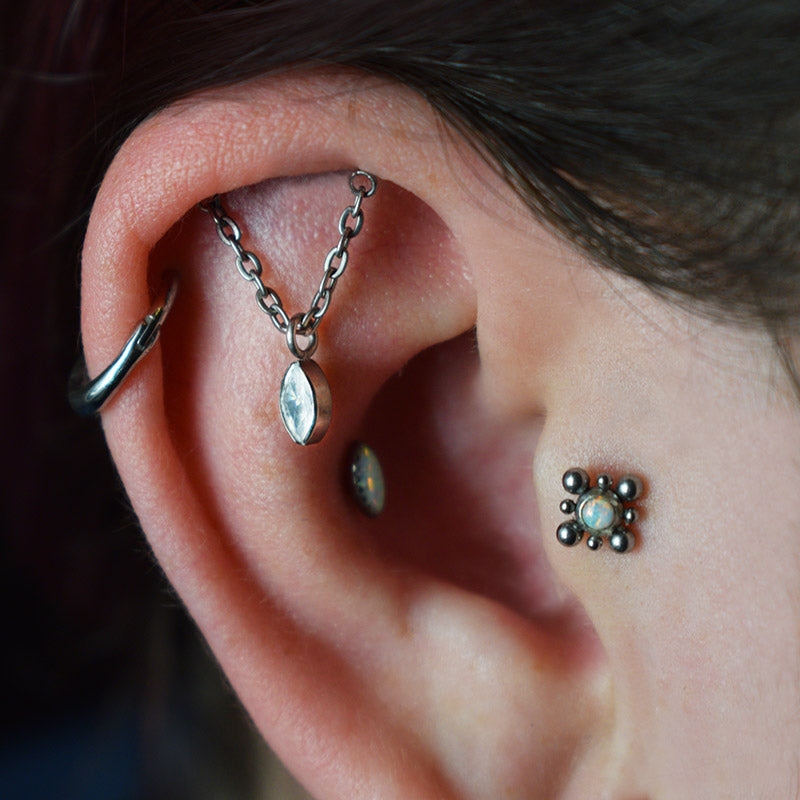 hidden helix piercing with crystal gem